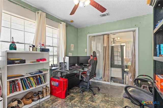 614 Cedar Dr, Copperas Cove, TX 76522 - home office featuring ceiling fan and a textured ceiling