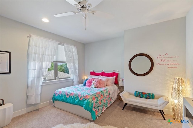 carpeted bedroom with ceiling fan