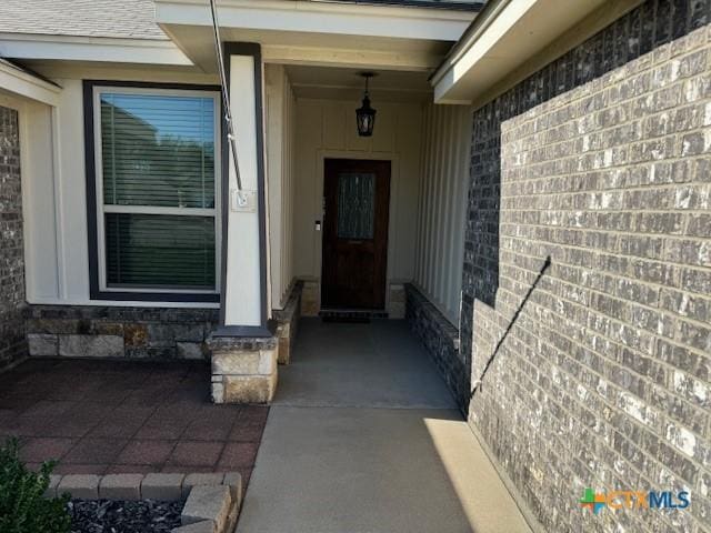 property entrance with a porch