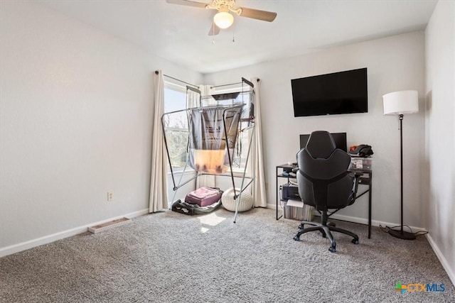 office area featuring carpet and ceiling fan