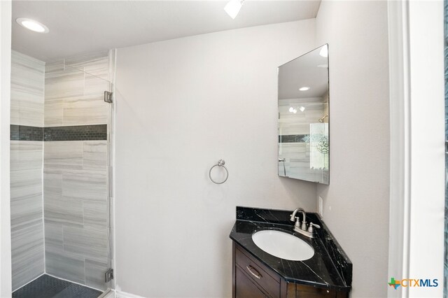 924 Kindersley St, Canyon Lake, TX 78133 - full bathroom with vanity and a shower stall