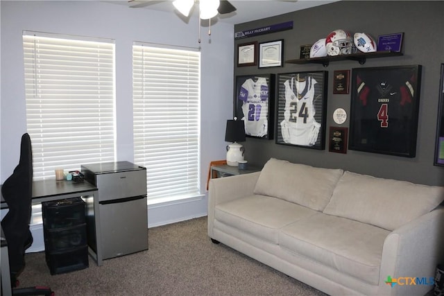 home office featuring carpet and ceiling fan