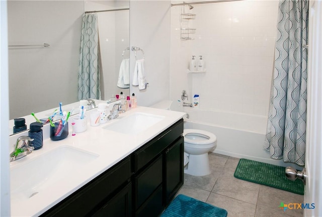 8915 Stonehollow Dr, Temple, TX 76502 - bathroom with shower / bathtub combination with curtain, toilet, double vanity, and tile patterned flooring
