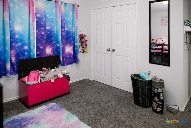 8915 Stonehollow Dr, Temple, TX 76502 - bedroom featuring carpet flooring, a closet, and baseboards