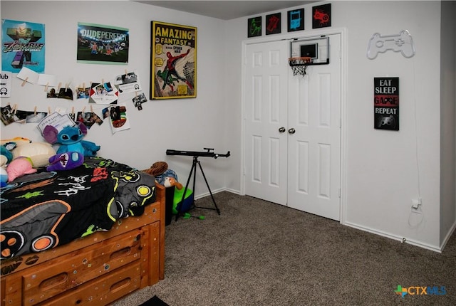 8915 Stonehollow Dr, Temple, TX 76502 - carpeted bedroom with a closet and baseboards
