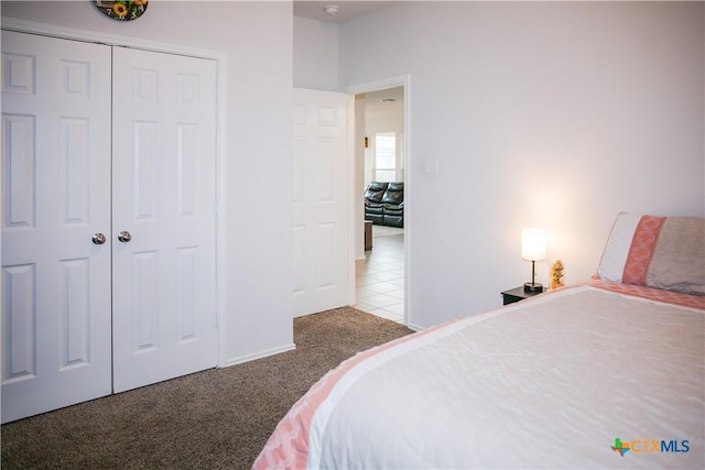 8915 Stonehollow Dr, Temple, TX 76502 - carpeted bedroom featuring a closet and baseboards