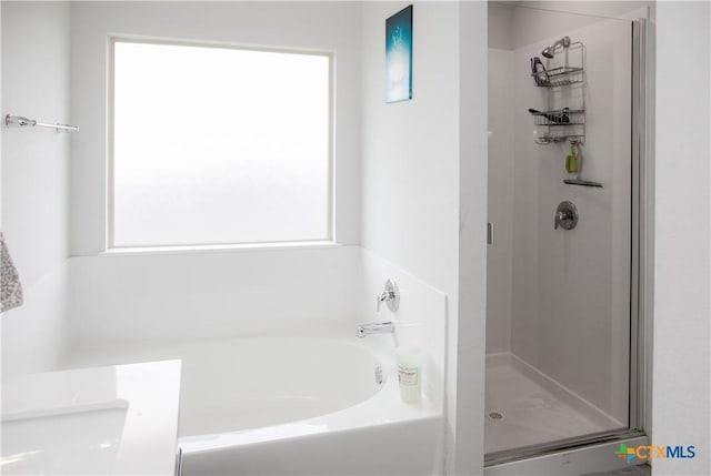 8915 Stonehollow Dr, Temple, TX 76502 - bathroom featuring a garden tub and a stall shower