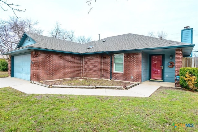 ranch-style home with a shingled roof, a chimney, an attached garage, a front lawn, and brick siding