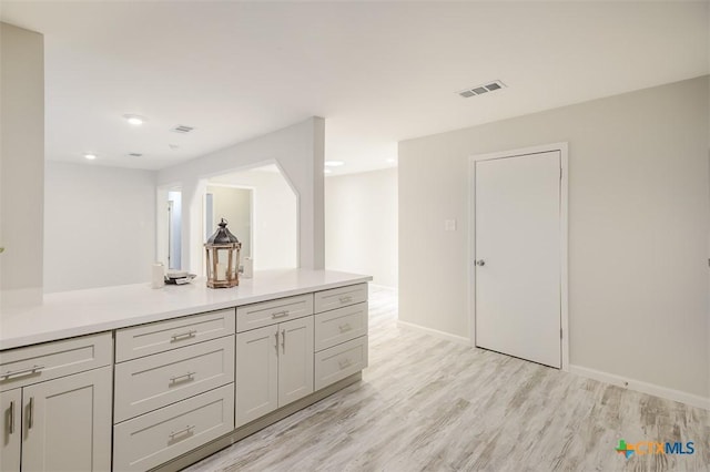 kitchen with light hardwood / wood-style floors