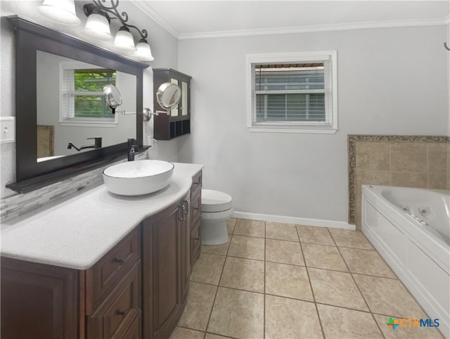 bathroom featuring ornamental molding, vanity, tile patterned flooring, a bathing tub, and toilet