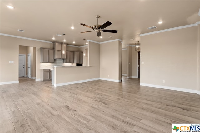 unfurnished living room featuring ceiling fan, light wood-type flooring, and crown molding