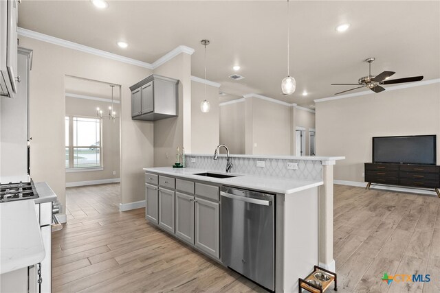 unfurnished dining area featuring light hardwood / wood-style flooring, a notable chandelier, and crown molding