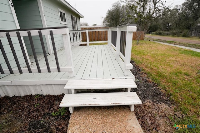 deck featuring a yard