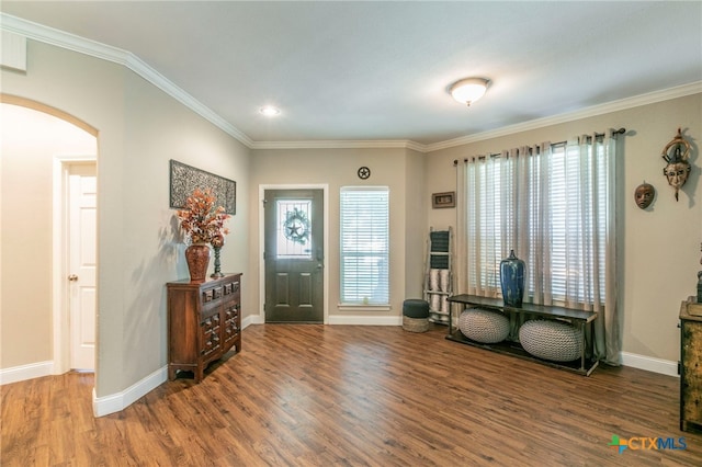 312 Ow Lowrey Dr, Salado, TX 76571 - entryway featuring arched walkways, wood finished floors, crown molding, baseboards, and recessed lighting