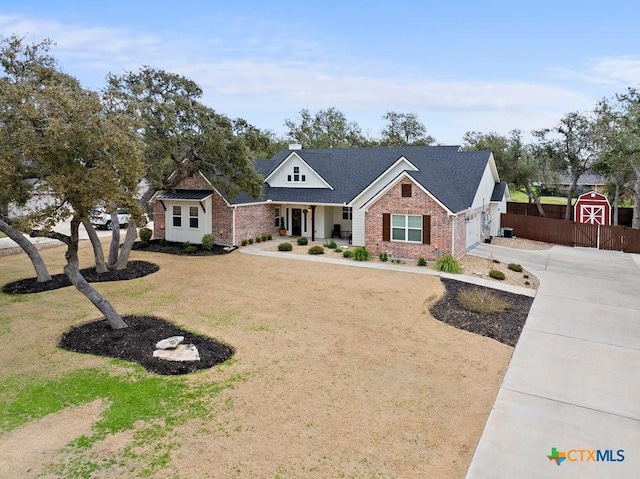 view of front of property with a porch and a front lawn