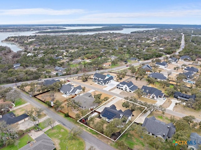 drone / aerial view featuring a water view