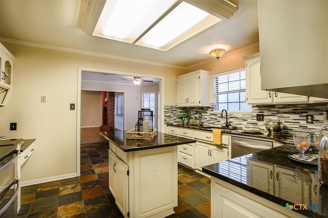 512 Gazelle Trl, Harker Heights, TX 76548 - kitchen with stone tile floors, a center island, tasteful backsplash, appliances with stainless steel finishes, and ornamental molding