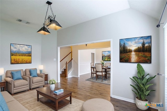 512 Gazelle Trl, Harker Heights, TX 76548 - living area featuring stairway, wood finished floors, and lofted ceiling