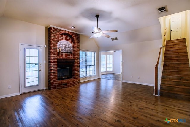512 Gazelle Trl, Harker Heights, TX 76548 - unfurnished living room with vaulted ceiling, ceiling fan, wood finished floors, a fireplace, and stairway