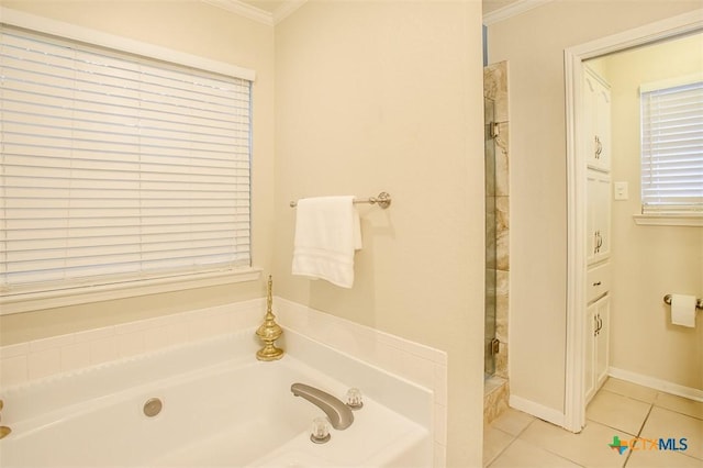 512 Gazelle Trl, Harker Heights, TX 76548 - full bath featuring ornamental molding, a garden tub, a stall shower, and tile patterned floors