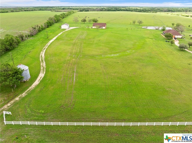 birds eye view of property featuring a rural view