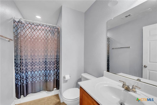 full bath with visible vents, a shower with curtain, toilet, and tile patterned flooring