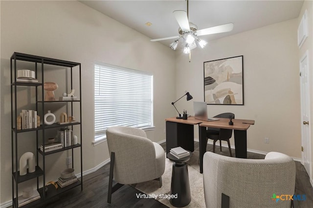 home office with dark wood-style floors, baseboards, and a ceiling fan