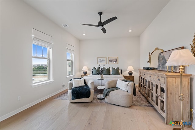 sitting room featuring ceiling fan, visible vents, baseboards, recessed lighting, and light wood-style flooring