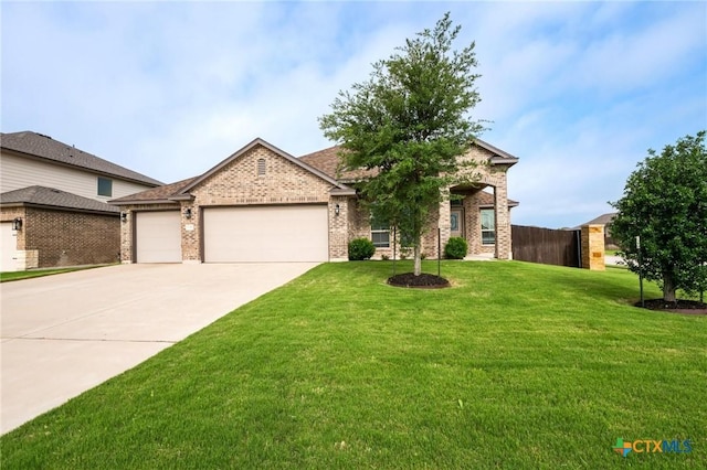view of front of house with a garage, brick siding, and concrete driveway