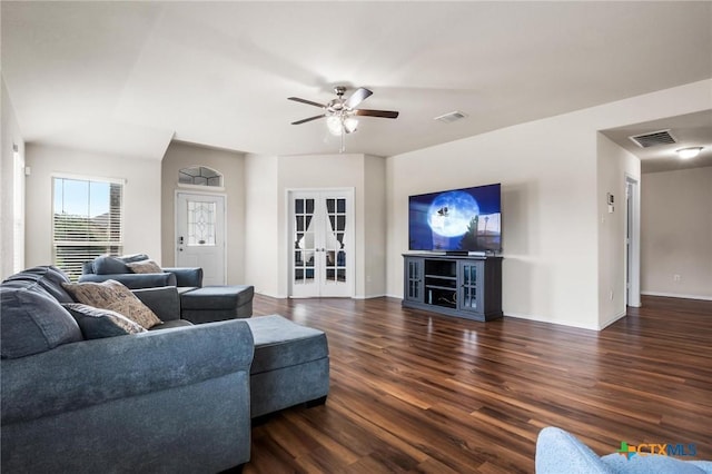 living area featuring a ceiling fan, wood finished floors, french doors, and baseboards