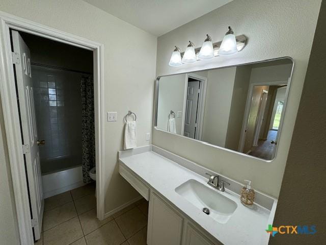 500 Chickasaw Dr, Harker Heights, TX 76548 - full bathroom with vanity, tile patterned floors, and shower / bath combo with shower curtain