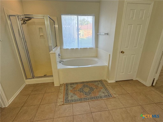 500 Chickasaw Dr, Harker Heights, TX 76548 - bathroom with tile patterned floors, a garden tub, and a shower stall