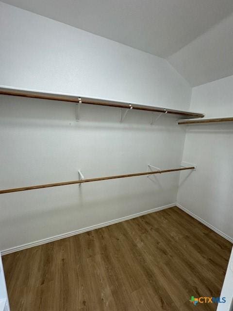 500 Chickasaw Dr, Harker Heights, TX 76548 - spacious closet featuring wood finished floors and vaulted ceiling