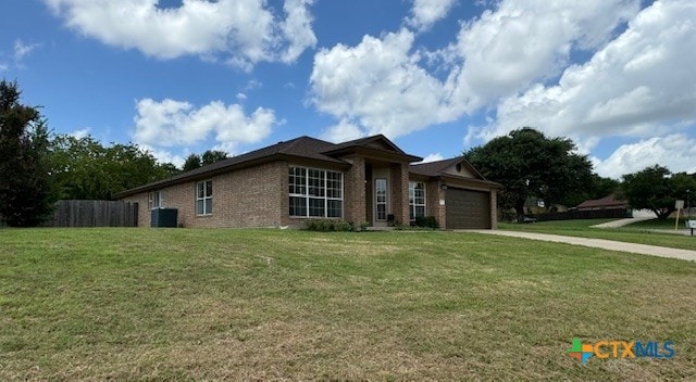 500 Chickasaw Dr, Harker Heights, TX 76548 - view of front of home with a garage, driveway, and brick siding