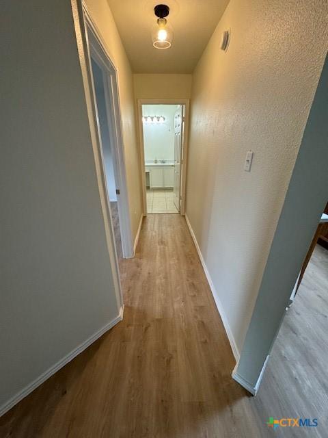 500 Chickasaw Dr, Harker Heights, TX 76548 - hall with wood finished floors and baseboards