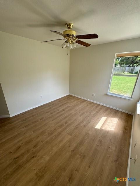 500 Chickasaw Dr, Harker Heights, TX 76548 - unfurnished room featuring wood finished floors and a ceiling fan