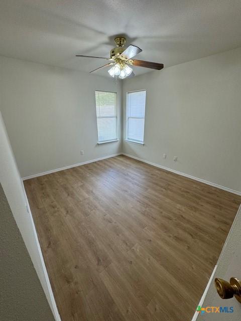 500 Chickasaw Dr, Harker Heights, TX 76548 - unfurnished room with wood finished floors and ceiling fan