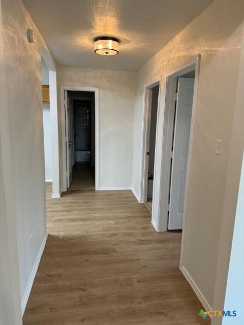 500 Chickasaw Dr, Harker Heights, TX 76548 - hallway with wood finished floors and baseboards