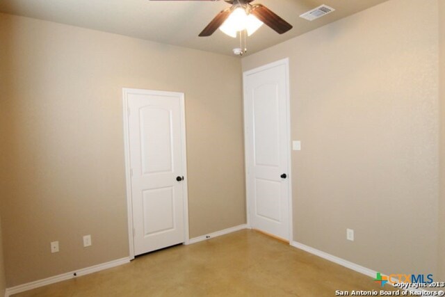 260-262 Rosalie Dr, New Braunfels, TX 78130 - empty room with baseboards, a ceiling fan, and visible vents
