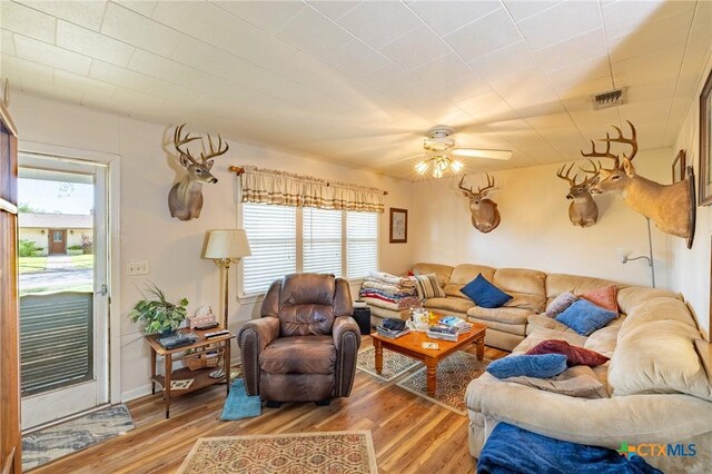 1429 Gardien St, Gonzales, TX 78629 - living area with visible vents, a ceiling fan, and light wood-style flooring