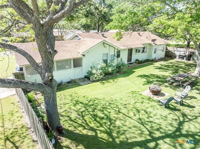 1429 Gardien St, Gonzales, TX 78629 - view of yard with a fenced backyard