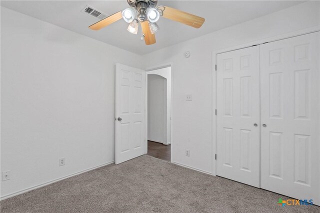 4401 Maggie Dr, Killeen, TX 76549 - unfurnished bedroom featuring carpet floors, a closet, a ceiling fan, and baseboards
