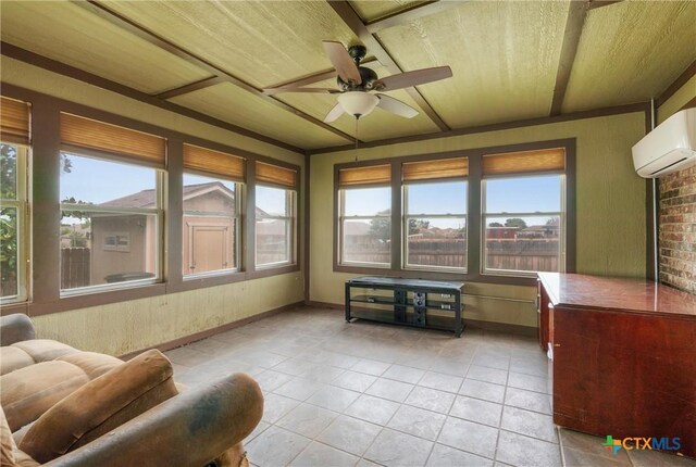 4401 Maggie Dr, Killeen, TX 76549 - sunroom featuring tile patterned flooring, healthy amount of natural light, a wall mounted AC, and baseboards