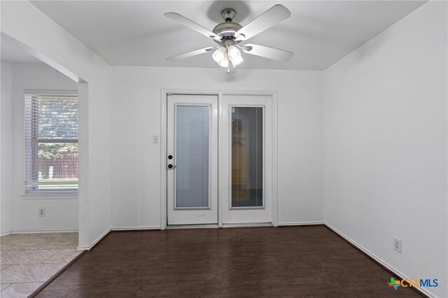 4401 Maggie Dr, Killeen, TX 76549 - unfurnished room featuring ceiling fan, wood finished floors, and baseboards