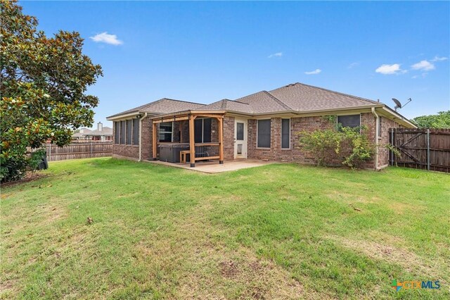 4401 Maggie Dr, Killeen, TX 76549 - rear view of house with a patio and brick siding