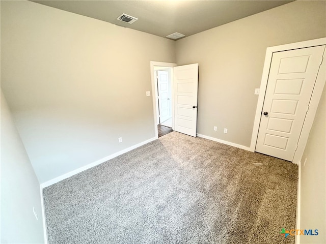 unfurnished bedroom featuring carpet floors