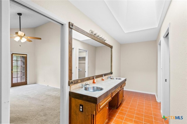 105 Creekside Dr, Victoria, TX 77904 - full bathroom with double vanity, ceiling fan, and tile patterned flooring