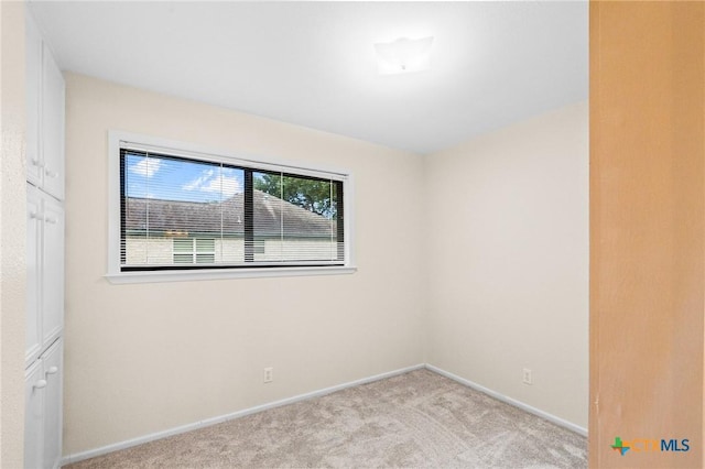 105 Creekside Dr, Victoria, TX 77904 - unfurnished room featuring carpet flooring