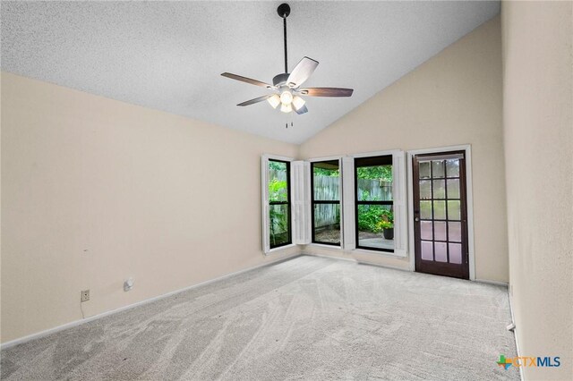 105 Creekside Dr, Victoria, TX 77904 - carpeted spare room with a ceiling fan, a textured ceiling, and high vaulted ceiling