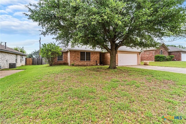 ranch-style house with concrete driveway, fence, central AC unit, brick siding, and a garage